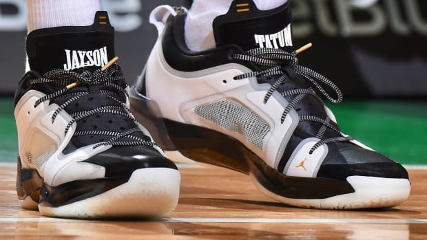 View of white and black Jordan shoes.